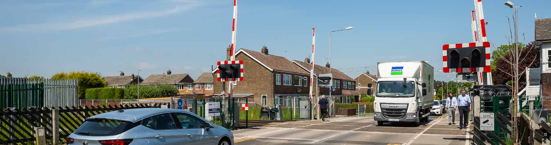 Vehicles at a level crossing