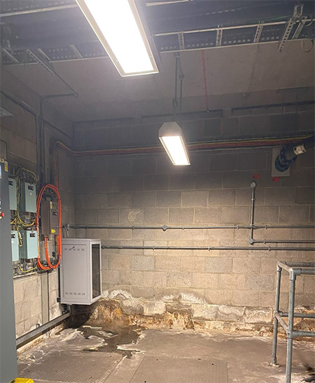 Electrical plant room in TfL station with water ingress problem. Water ingress is unwanted penetration of water into buildings or structures which can lead to significant damage and deterioration.  