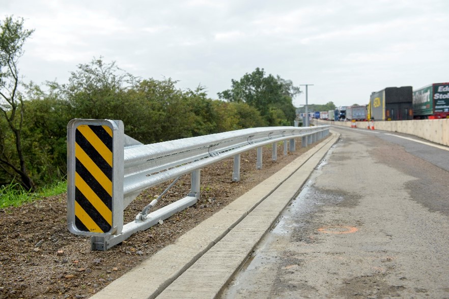 A steel vehicle restraint system along the side of the road verge