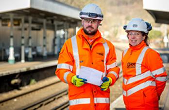Rail workers on platform