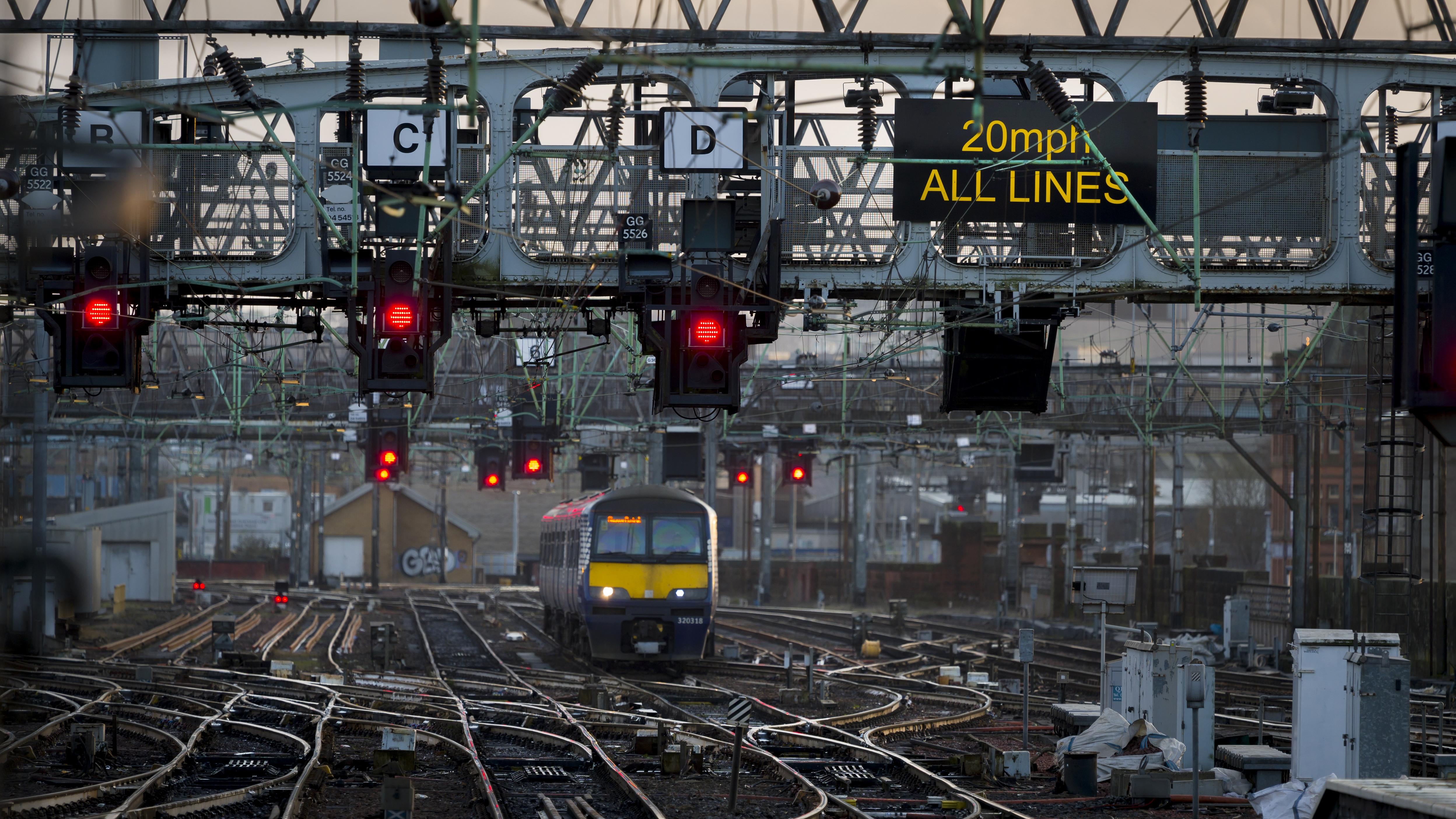 An image of a ScotRail train pulling into a train station