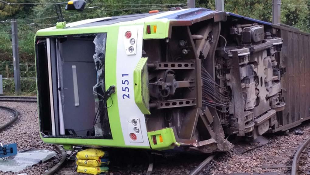 Image of overturned tram at Sandilands junction, by the Rail Accident Investigation Branch. Licensed under the Open Government Licence v3.0.
