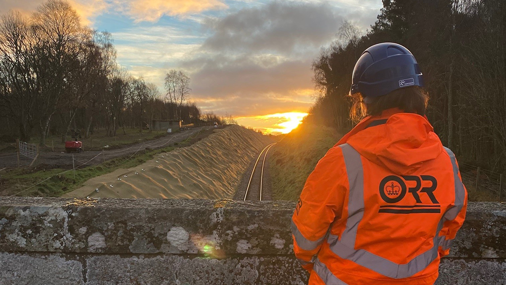 Civil Engineer looking at a sunset on a site visit