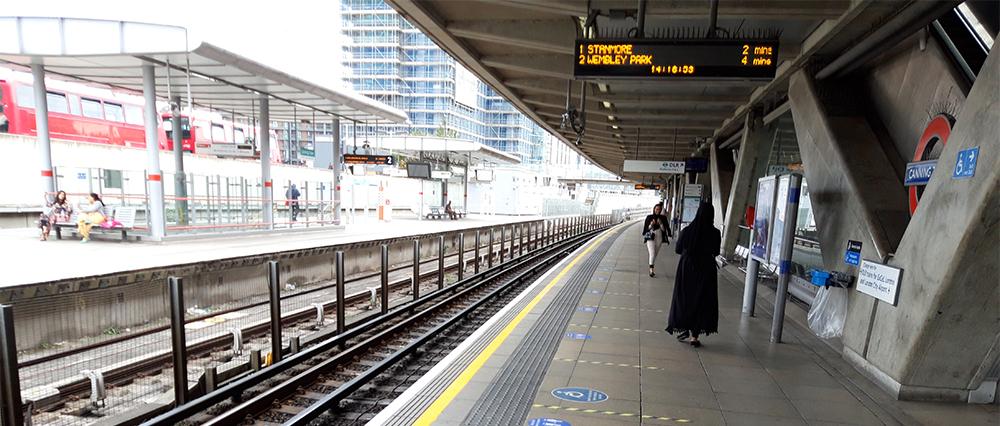 London Canning Town station platform with markings for social distancing