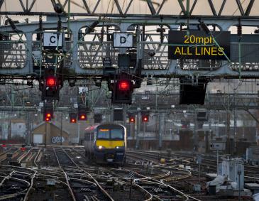 An image of a ScotRail train pulling into a train station