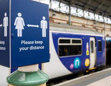 Covid-19 social distancing sign at Manchester Piccadilly station