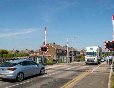 Vehicles at a level crossing