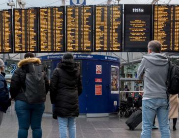 Railway passengers at Manchester Piccadilly concourse