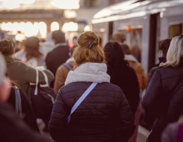 Passengers at busy station