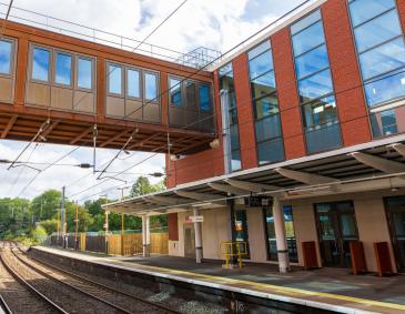 Photo of the rail link bridge and new station building at University station